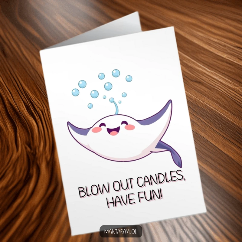 Funny free printable Happy Birthday card: A joyful manta ray blows a stream of bubbles upwards towards the ocean surface.